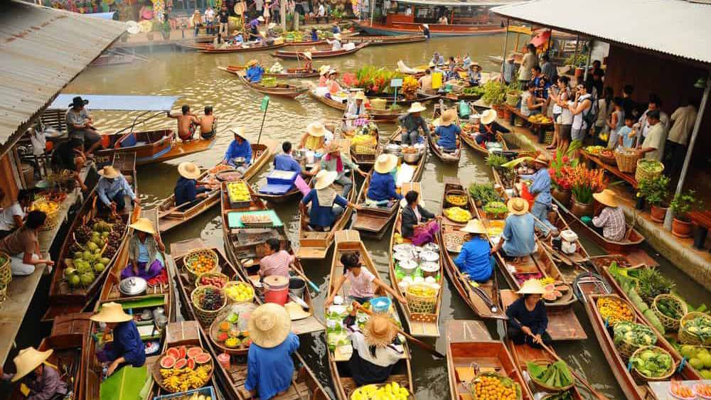 damnoen-saduak-floating-market-and-erawan-waterfall-2